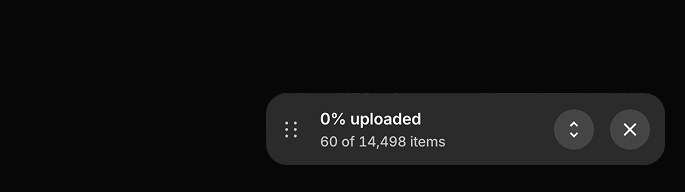 Minimized upload progress card in the bottom-right corner